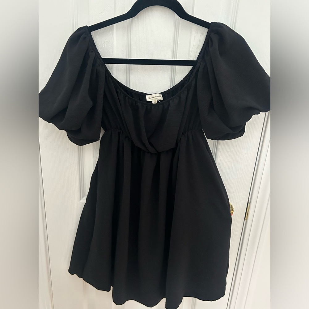 Black mini dress with puff sleeves
